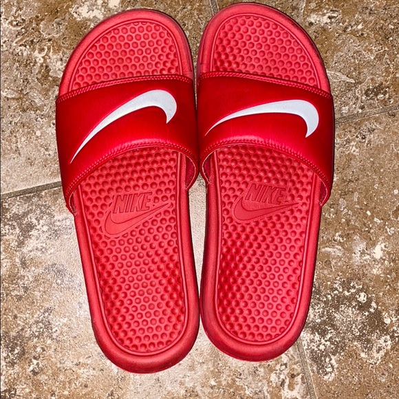 nike slides with red logo